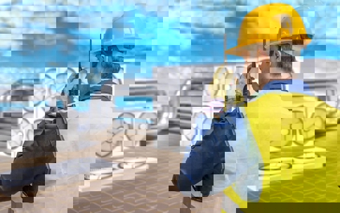 hvac tech on roof with AC