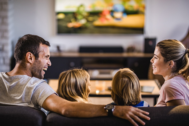 Heating Repair Family Watching Tv